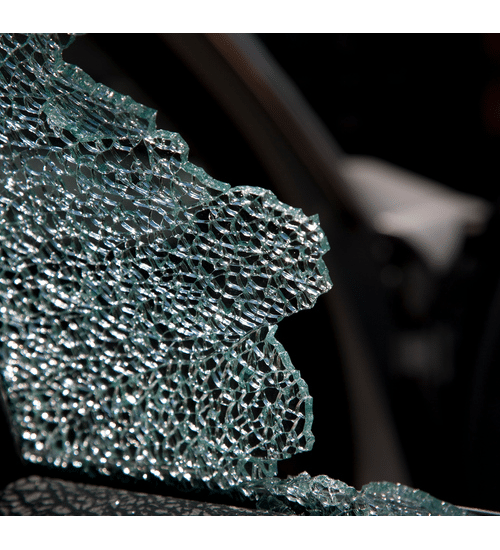 A close up picture of broken glass