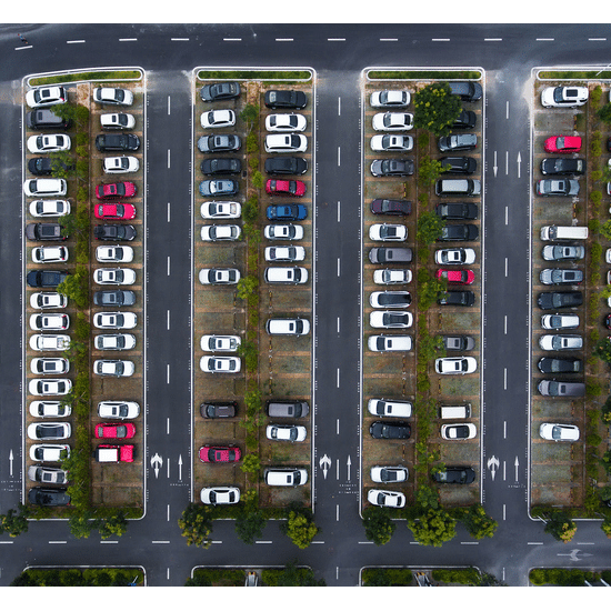 An image of parking spaces with streets