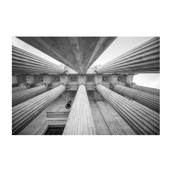 Roman Columns seen from below and going up to a roof in perspective